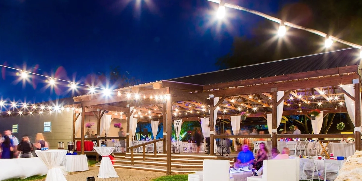 Bridal party celebrating outdoors at Granberry Hills Event Facility in San Antonio