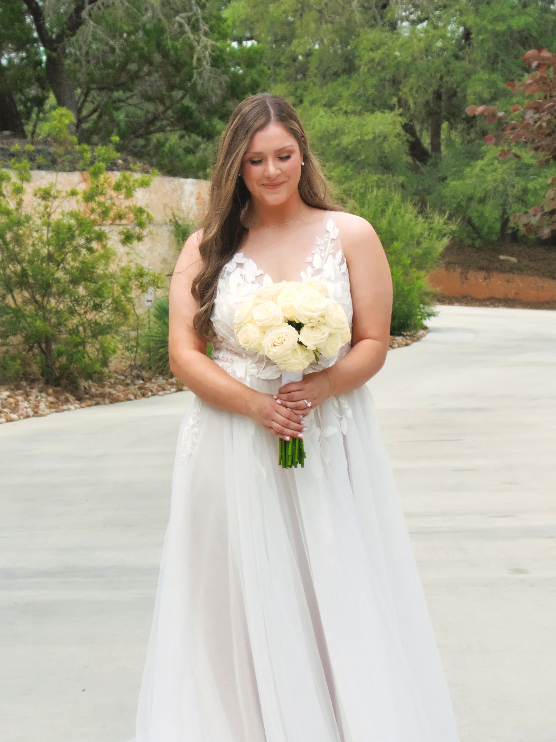 Boerne wedding details with rings flowers and elegant styling