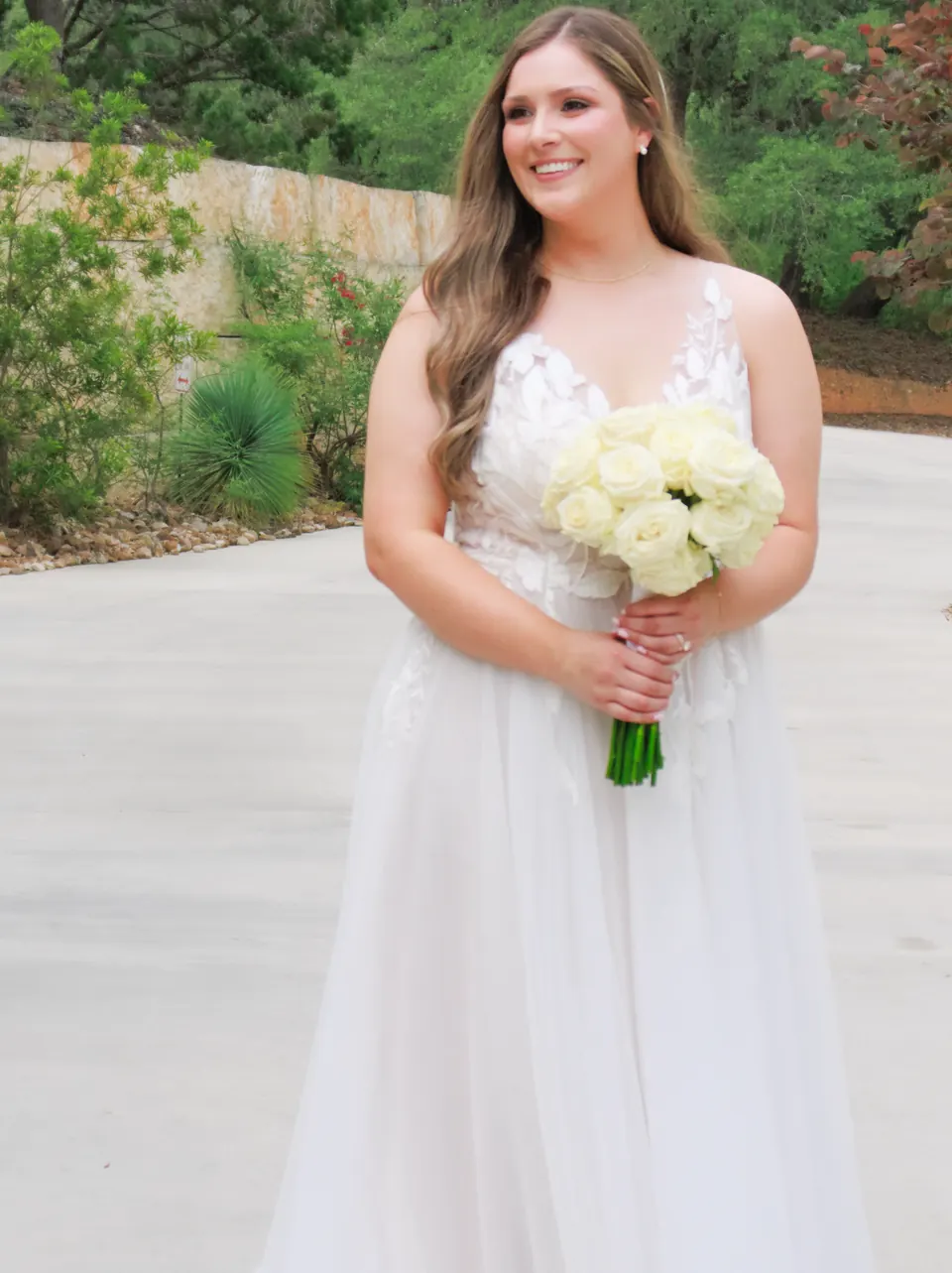 Bridal portrait with a white rose bouquet at The Preserve at Canyon Lake